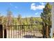 Stunning mountain view from a private balcony at 11648 Broken Arrow Dr, Conifer, CO 80433