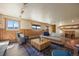 Spacious living room with comfortable seating and a view at 11648 Broken Arrow Dr, Conifer, CO 80433