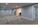 Spacious finished basement with neutral carpet and recessed lighting, perfect for entertaining and relaxing at 1601 S Glencoe St, Denver, CO 80222