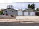 Detached garage with a multi-car driveway for additional parking at 1601 S Glencoe St, Denver, CO 80222