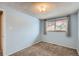 A blue bedroom with gray carpet at 431 S Balsam St, Lakewood, CO 80226