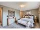 Serene bedroom with soft colors, comfortable bed, and stylish decor at 431 S Balsam St, Lakewood, CO 80226