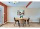 Cozy dining area with modern table, chairs, and ample natural light at 431 S Balsam St, Lakewood, CO 80226