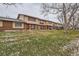Well-maintained two-story townhomes with brick accents and well-kept front lawns at 431 S Balsam St, Lakewood, CO 80226