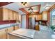 Well-appointed kitchen with a stainless steel refrigerator and ample cabinet space at 431 S Balsam St, Lakewood, CO 80226