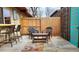 Patio with seating and fenced-in yard at 431 S Balsam St, Lakewood, CO 80226