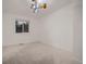 Bright bedroom featuring neutral carpet, a window with a view, and a fun airplane ceiling light at 8916 Sunridge Hollow Rd, Parker, CO 80134