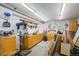 Basement workshop featuring built-in cabinets, workspace, and specialized equipment at 31719 Rocky Village Dr # 317, Evergreen, CO 80439