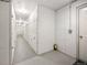 Basement hallway featuring storage lockers at 31719 Rocky Village Dr # 317, Evergreen, CO 80439
