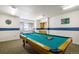 Game room featuring a pool table, window, and serving area at 31719 Rocky Village Dr # 317, Evergreen, CO 80439