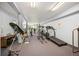 Spacious gym with fitness equipment and large windows for ample lighting at 31719 Rocky Village Dr # 317, Evergreen, CO 80439
