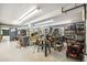 Spacious workshop area equipped with various tools and ample lighting at 31719 Rocky Village Dr # 317, Evergreen, CO 80439