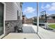 Spacious backyard featuring a stone patio, lawn, trampoline, and basketball hoop, perfect for outdoor fun at 27504 E 1St Pl, Aurora, CO 80018