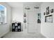 Nautical themed room featuring neutral colored walls and carpet with white trim and plenty of natural light at 27504 E 1St Pl, Aurora, CO 80018
