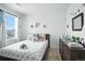 Comfortable bedroom with a large window and plenty of natural light at 27504 E 1St Pl, Aurora, CO 80018