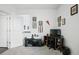 Bedroom with a desk, personal decorations, and neutral walls and carpet at 27504 E 1St Pl, Aurora, CO 80018