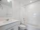 Bathroom featuring vanity and tub with shower at 1102 Ridgefield Dr, Berthoud, CO 80513