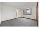 Bedroom with a window providing ample sunlight and a neutral color palette at 1770 S Quintero Way, Aurora, CO 80017