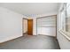 Bedroom featuring neutral colors and closet space at 1770 S Quintero Way, Aurora, CO 80017