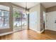 Bright dining area with hardwood floors and sliding glass door to the backyard at 736 Trenton St, Denver, CO 80230