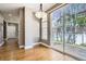 Bright dining area with hardwood floors, sliding glass doors and backyard view at 736 Trenton St, Denver, CO 80230