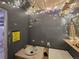 View of a small, partially renovated bathroom with sink, decorations and lighting at 10211 Ura Ln # 5-206, Thornton, CO 80260