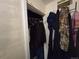 Closet space showcasing ample hanging storage for clothing at 10211 Ura Ln # 5-206, Thornton, CO 80260