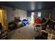 Bright living room with patterned carpet and furniture at 10211 Ura Ln # 5-206, Thornton, CO 80260
