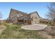 Expansive backyard with a concrete patio and deck, providing ample space for outdoor enjoyment at 6302 E 135Th Ave, Thornton, CO 80602