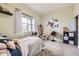 bedroom with a window at 6302 E 135Th Ave, Thornton, CO 80602
