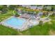 Neighborhood park with a playground in a green space with a paved walking path at 3656 E 134Th Dr, Thornton, CO 80241