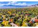 An aerial view highlights the property's location, lush foliage, and quiet surroundings at 3737 26Th St, Boulder, CO 80304