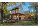 Beautiful home exterior with a spacious deck and manicured landscaping at 3737 26Th St, Boulder, CO 80304