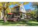 Stylish home with an expansive deck, patio seating, and vibrant yard at 3737 26Th St, Boulder, CO 80304