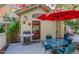 Outdoor patio area with dining table, grill and lush green trees at 3737 26Th St, Boulder, CO 80304
