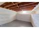 Unfinished basement with painted floor and cinder block walls at 3737 26Th St, Boulder, CO 80304