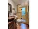 This bathroom features a glass shower, vessel sink, and warm colors at 3737 26Th St, Boulder, CO 80304