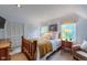 Comfortable bedroom with natural light, wood-frame bed, and closet storage at 3737 26Th St, Boulder, CO 80304