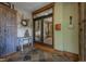 An inviting foyer features decorative slate tile flooring, decorative table, and double glass paneled doors at 3737 26Th St, Boulder, CO 80304