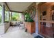 Inviting front porch with comfortable seating, brick wall, and stylish decor at 3737 26Th St, Boulder, CO 80304