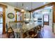 This kitchen features a large island with seating and a view to the front door at 3737 26Th St, Boulder, CO 80304