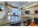 This kitchen features a large island, stainless appliances, and unique lighting fixtures at 3737 26Th St, Boulder, CO 80304