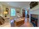 This living room features a fireplace, view to another room, and a comfortable sofa at 3737 26Th St, Boulder, CO 80304