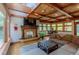 A luxurious living room features a fireplace, coffered ceilings, and abundant natural light at 3737 26Th St, Boulder, CO 80304