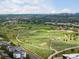 Beautiful aerial view of community park featuring walking trails, greenery, and open space at 8336 E 35Th Ave, Denver, CO 80238