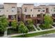 Contemporary townhomes with modern architecture and manicured landscaping at 8336 E 35Th Ave, Denver, CO 80238