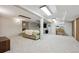 Finished basement offering flexible living space with carpeted floors and recessed lighting at 8205 Dudley Way, Arvada, CO 80005