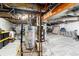 Exposed basement featuring utility systems, storage and finished flooring at 3220 W 24Th Ave, Denver, CO 80211