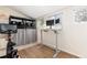 Bright office space featuring a standing desk, dual monitors, and a Peloton exercise bike at 3220 W 24Th Ave, Denver, CO 80211