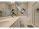 Bathroom featuring double sinks, a soaking tub, and walk-in shower at 9279 Merino Ct # D, Littleton, CO 80125